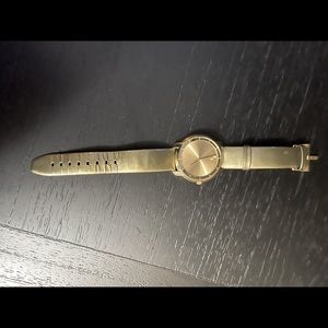 Movado Women’s watch . Green band. Gold facing. Beautiful !!